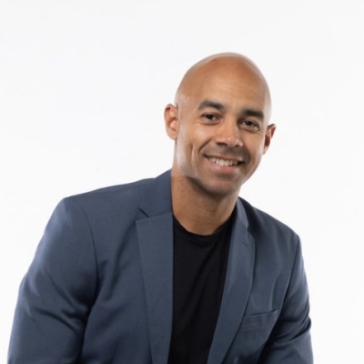 Picture of Colin Stevens, wearing a suit